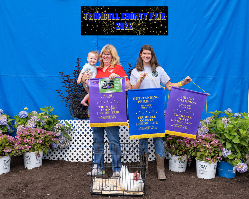 Grace Stout sold the grand champion chickens to Geauga Credit Union.