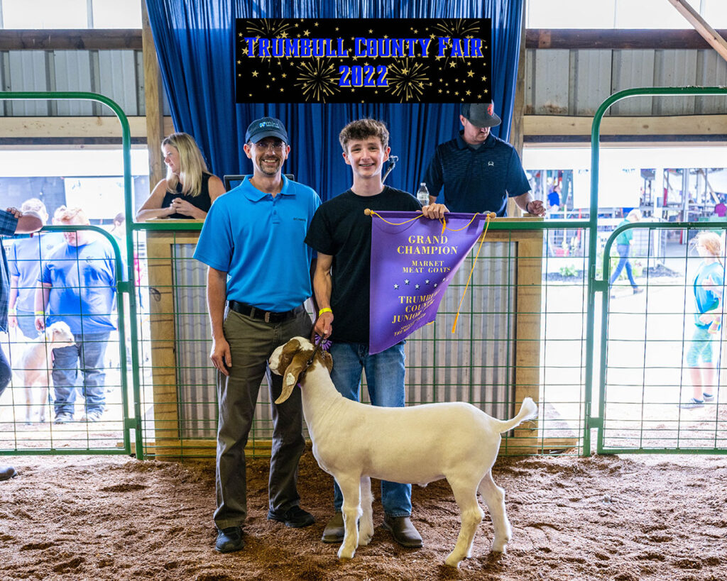Justin Franko sold the grand champion goat to Dr. Benton, D.D.S., for $8 per pound.